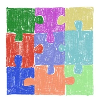 bunte Puzzleteile greifen ineinander